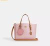 Túi Tote Coach Mollie Tote Bag 25 In Signature Canvas With Charms Powder Pink CER24