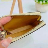  Ví Thẻ Coach Zip Card Case In Signature Canvas Màu Vàng Nhạt 