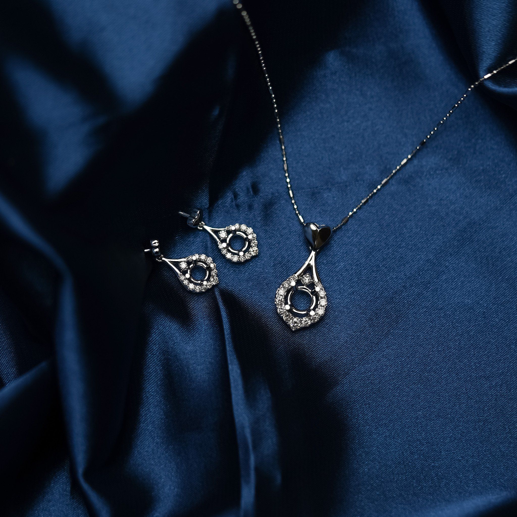 SEMI-SET HEART DANGLE STUD EARRINGS