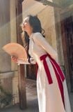  W - Áo dài Joyus trắng khoét vai đính nơ đỏ quần đỏ JOYUS 