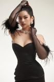  Váy đen ngắn cúp ngực kèm bao tay lông GLAMDOLL 