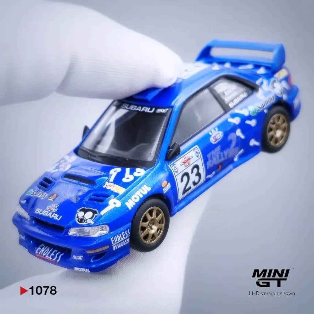 Mô hình xe Subaru Impreza WRC99 #23 2000 1:64 MiniGT