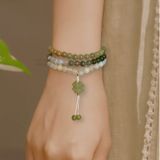  Chuỗi ngọc hòa điền mix charm cỏ 4 lá 