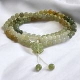  Chuỗi ngọc hòa điền mix charm cỏ 4 lá 