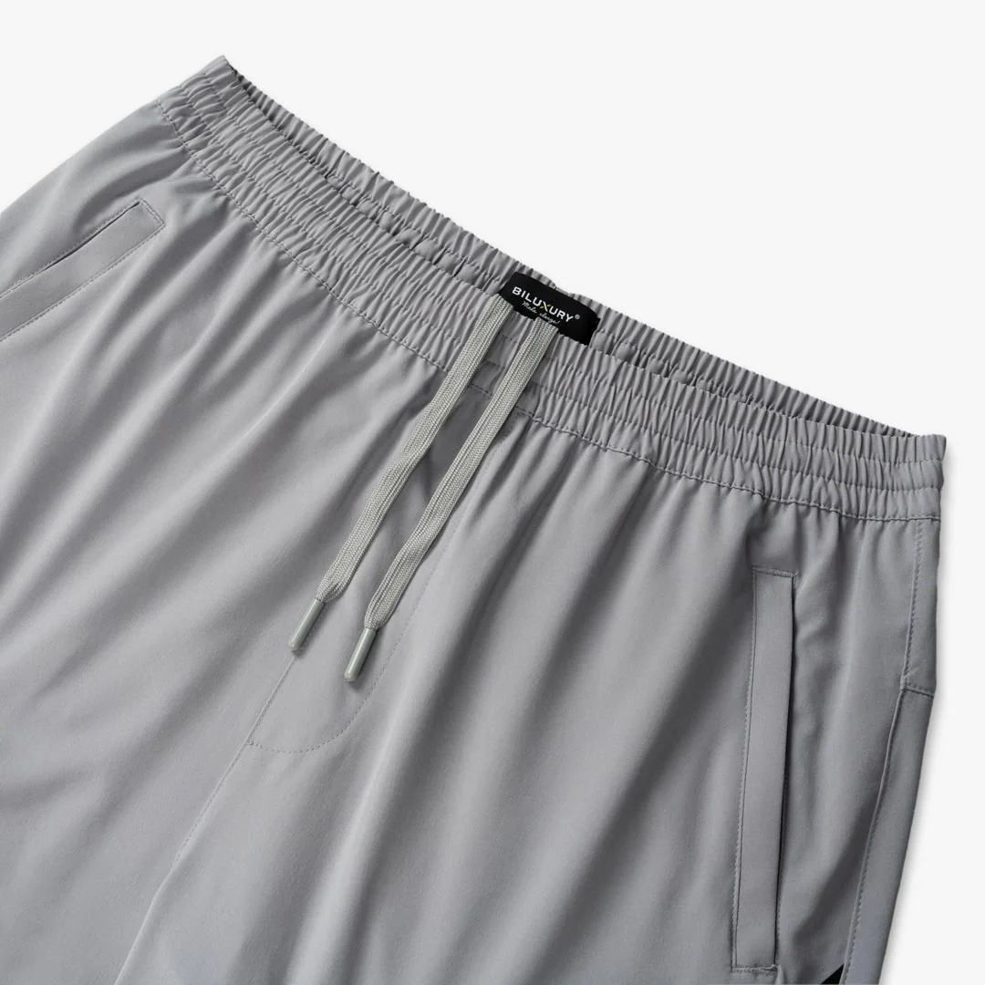QUẦN SHORT GIÓ THIẾT KẾ CAO CẤP - GHI SÁNG 1QDGT601GHS