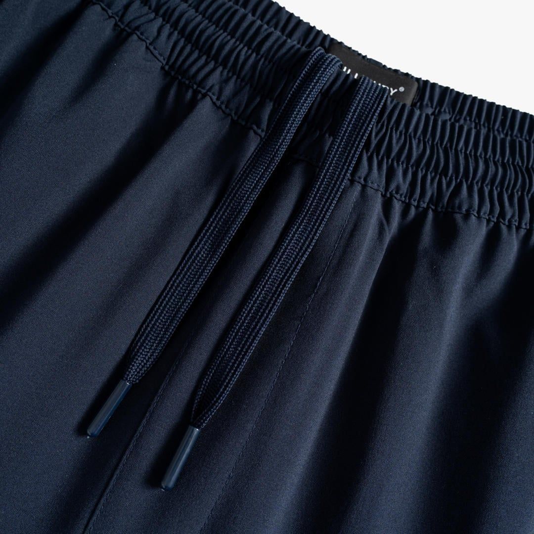 QUẦN SHORT GIÓ THỂ THAO - TÍM THAN TỐI 1QDGT601TTT