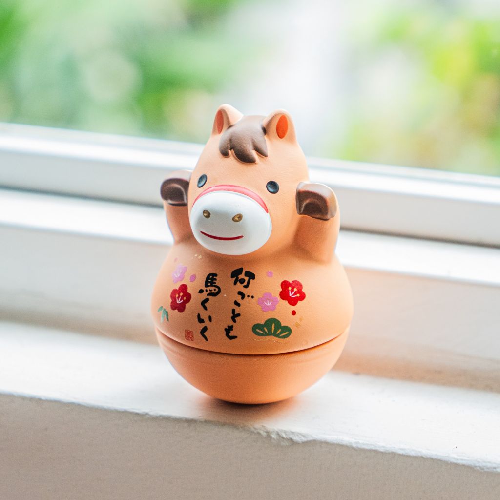 Ngựa lật đật may mắn