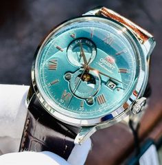 Đồng Hồ ORIENT Sun And Moon Bambino RA-AK0805E30B