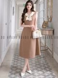  Đầm nâu phối nơ kem 