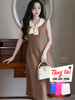  Đầm nâu phối nơ kem 