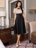  Đầm nude phối đen 