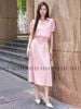  Set áo hồng tay phồng váy xếp ly 