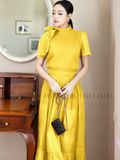  Set áo váy vàng cột nơ 