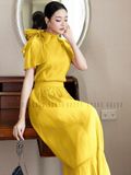  Set áo váy vàng cột nơ 