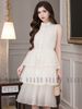  Đầm babydoll kem vàng cổ trụ 