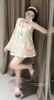 Váy chấm bi dáng babydoll dây bản nơ phối viền bèo - V34 ( chiều dài 75cm )