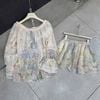 Set áo trễ vai tết dây hoa tay dài mix chân váy hoa văn - K41