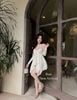  Set 2 món váy hai dây viền beo vạt nhọn kèm áo khoác mỏng - KEM - K6 