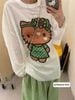 Set áo tay dài hoạ tiết Hello Kitty mix quần suông rộng bo gấu caro - XANH LÁ - V128