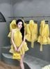 Đầm thiết kế áo cổ yếm hở lưng tùng xếp nhiều tầng - VÀNG - Q155