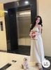 Đầm 2 dây suông hở lưng họa tiết MÔI - TRẮNG - K37
