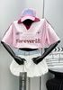 Set áo polo in chữ FOREVER 18 phối sọc vai dây rút eo croptop mix chân váy kaki túi hộp - HỒNG - T661 (EO S<64, M<68CM ,L<72CM)