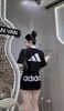 Set áo croptop ADIDAS mix chân váy dây rút - ĐEN - Q97