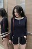 Set áo tay dài phối màu đính cúc mix quần short vạt bầu phối viền - XANH - R100