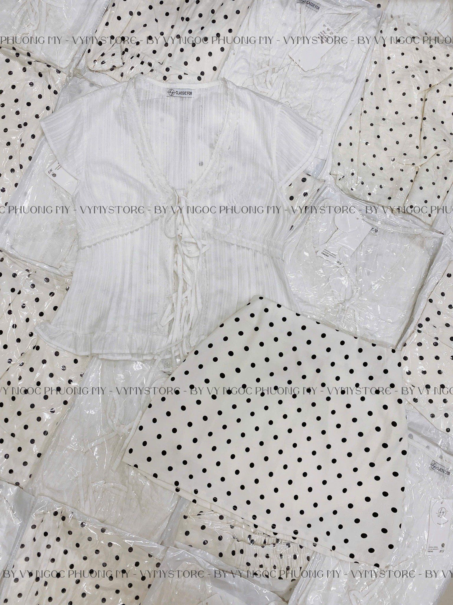  Set áo tay hến cổ v buộc dây mix chân váy chấm bi form A 50% chun - C25 