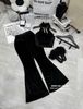 Set áo yếm lông đính nơ mix quần suông ống loe lưng chun chất nhung - ĐEN - C229