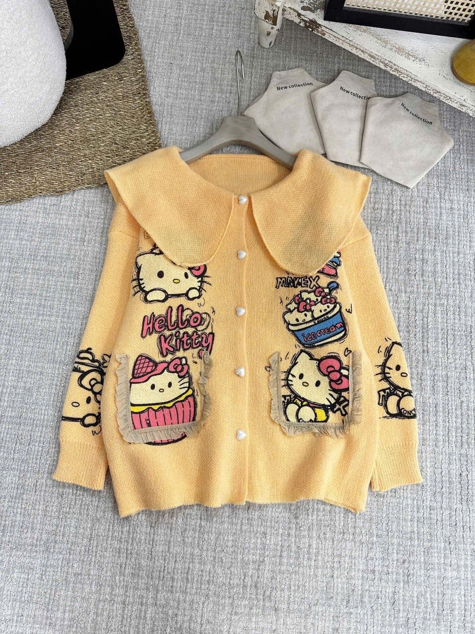  Áo len cổ bèo viền túi kiểu HELLO KITTY nút tim hàng QC - VÀNG - G31 