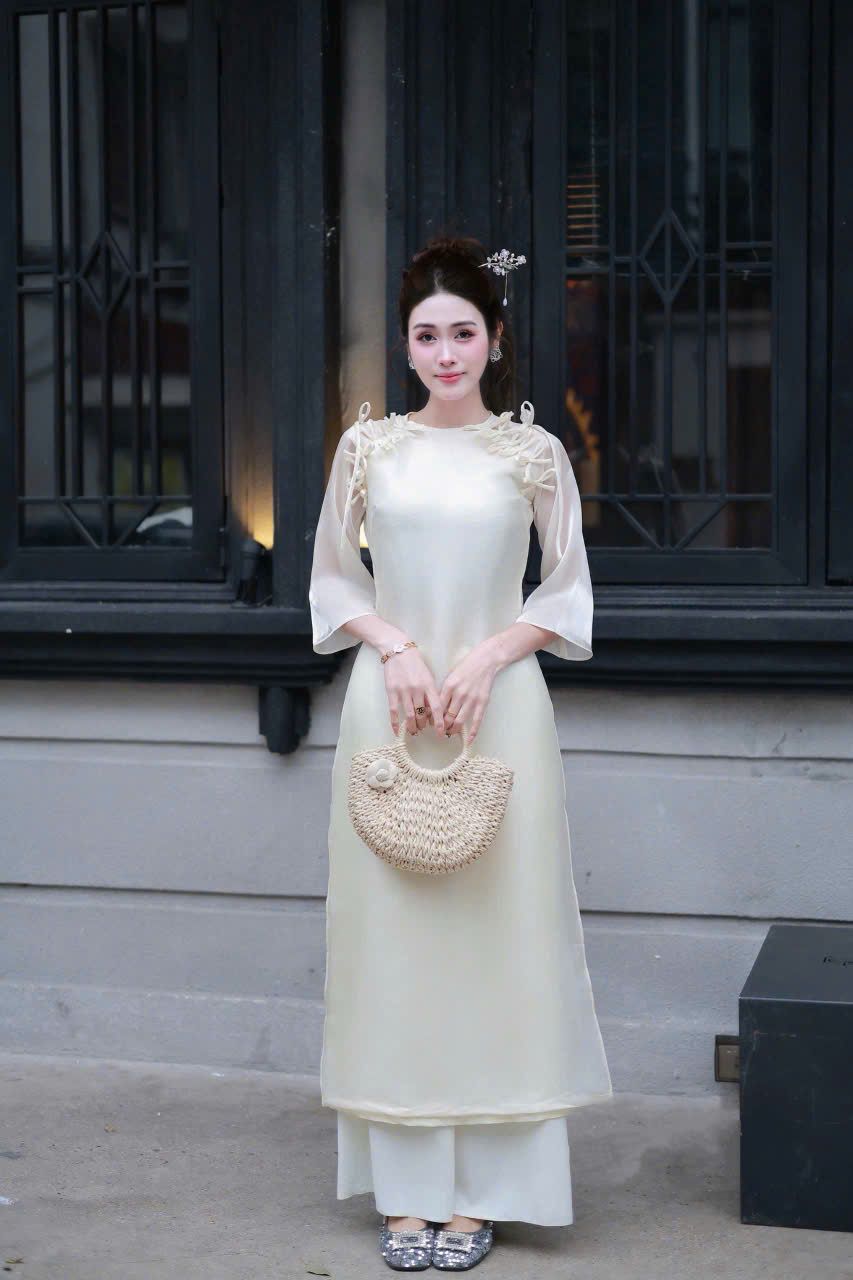  Set áo dài cổ tròn tay lỡ đính nơ chất tơ óng ánh + quần lụa 50% lưng chun cao cấp - KEM - G41 (S<52KG, <57KG) 