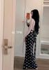Váy hai dây hở lưng đính nơ dáng dài chấm bi - ĐEN - E210 (EO S<68, M<72)