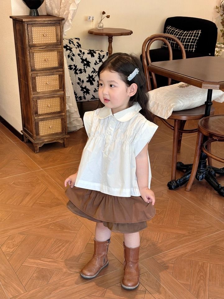 Set Bé Gái Áo Trắng Nhún Ngực Mix Chân Váy Nâu 2 Tầng Có Chip