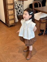 Set Bé Gái Áo Trắng Nhún Ngực Mix Chân Váy Nâu 2 Tầng Có Chip