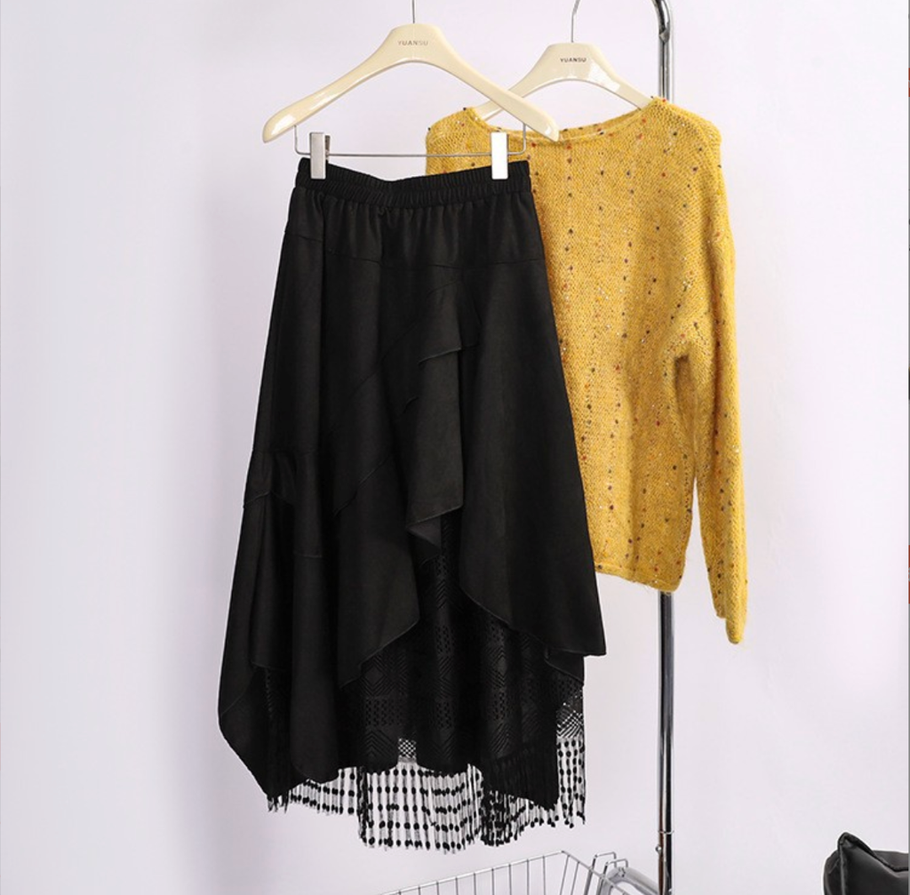 Chân váy da lộn tua rua