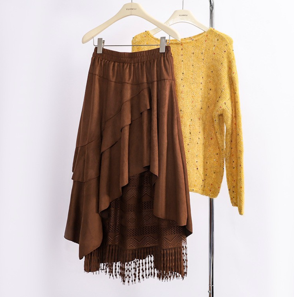 Chân váy da lộn tua rua