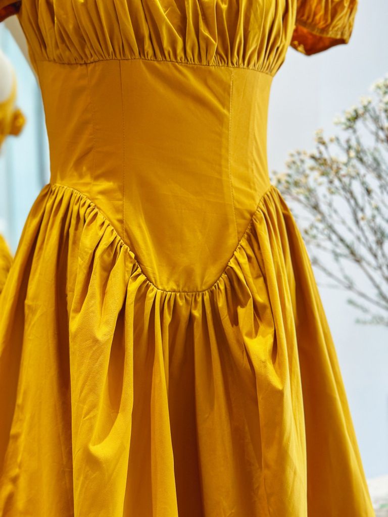  Đầm nhúng tùng phồng vàng 