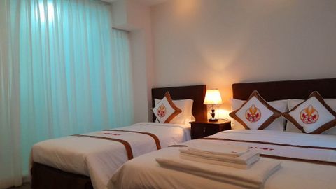  40/9 Phòng Signature 3 Khách 2 giường, cửa sổ mở 