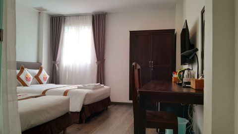  40/9 Phòng Signature 3 Khách 2 giường, cửa sổ mở 