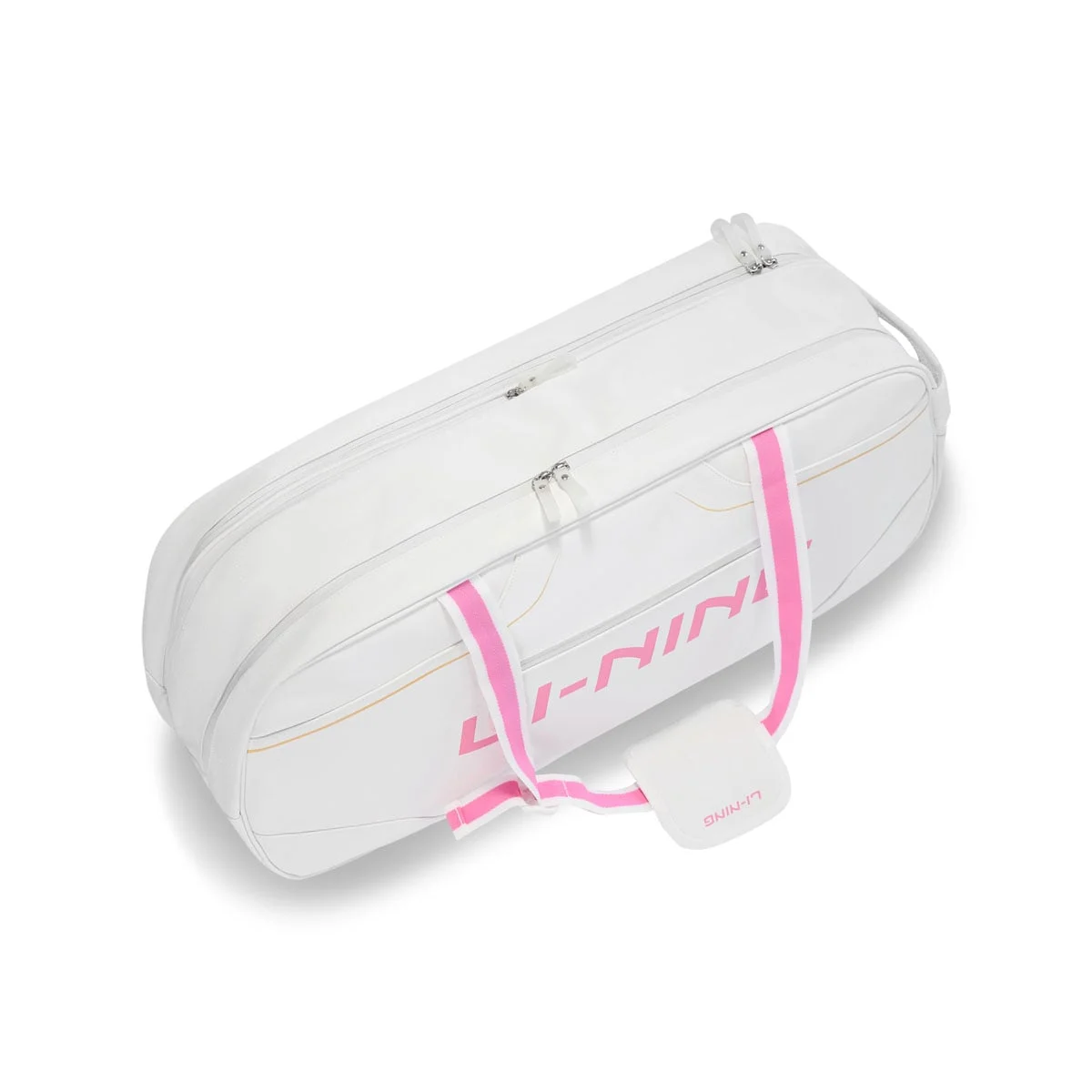 Bao vợt Li-Ning ABLW117 nhìn từ trên xuống, thấy rõ hai ngăn chính với hai khóa kéo lớn riêng biệt, dây đeo vai màu hồng trắng có miếng đệm vai in chữ LI-NING