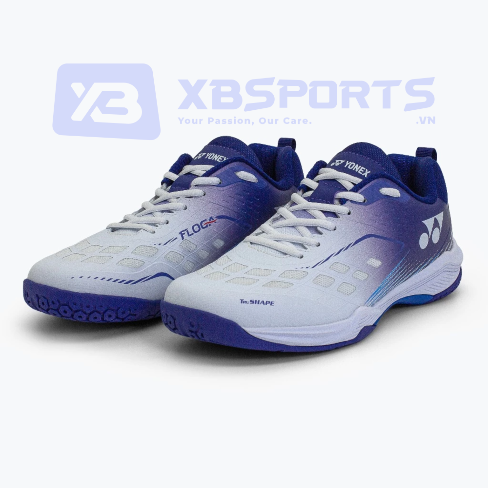 Giày cầu lông Yonex Floga màu Polar White Illusion Blue, thân trắng chuyển gradient xanh tím ở gót, đế xanh tím, in chữ FLOGA và Tru.SHAPE ở thân giày, logo Yonex