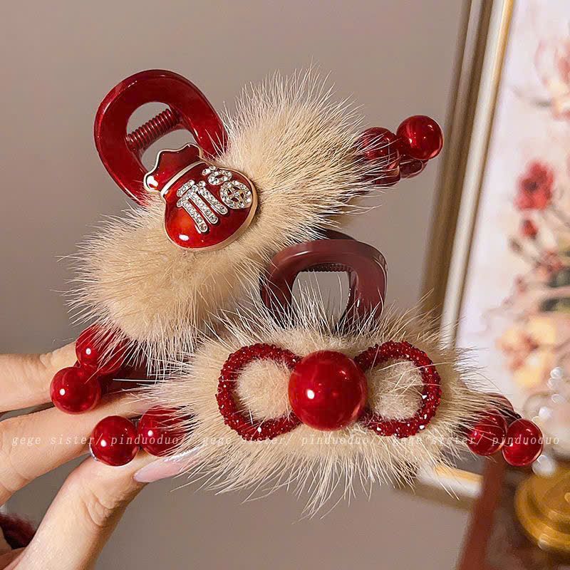  Kẹp Tóc Đính Hạt Đỏ Và Lông Vũ Giả 