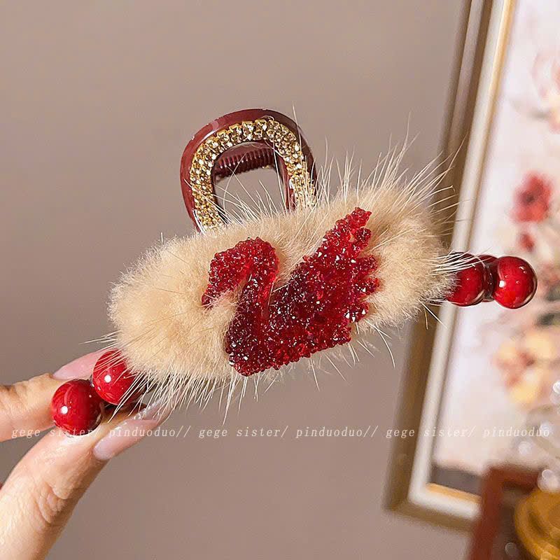  Kẹp Tóc Đính Hạt Đỏ Và Lông Vũ Giả 