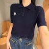  Áo polo xanh navy logo huy hiệu 
