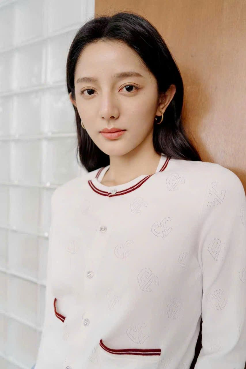  Áo CDG trắng cổ tròn dệt họa tiết – Cotton pha Silk 