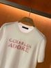  Áo dệt kim trắng chữ hồng ADORE 