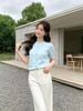  Áo CDG ngắn tay xanh pastel họa tiết chìm 