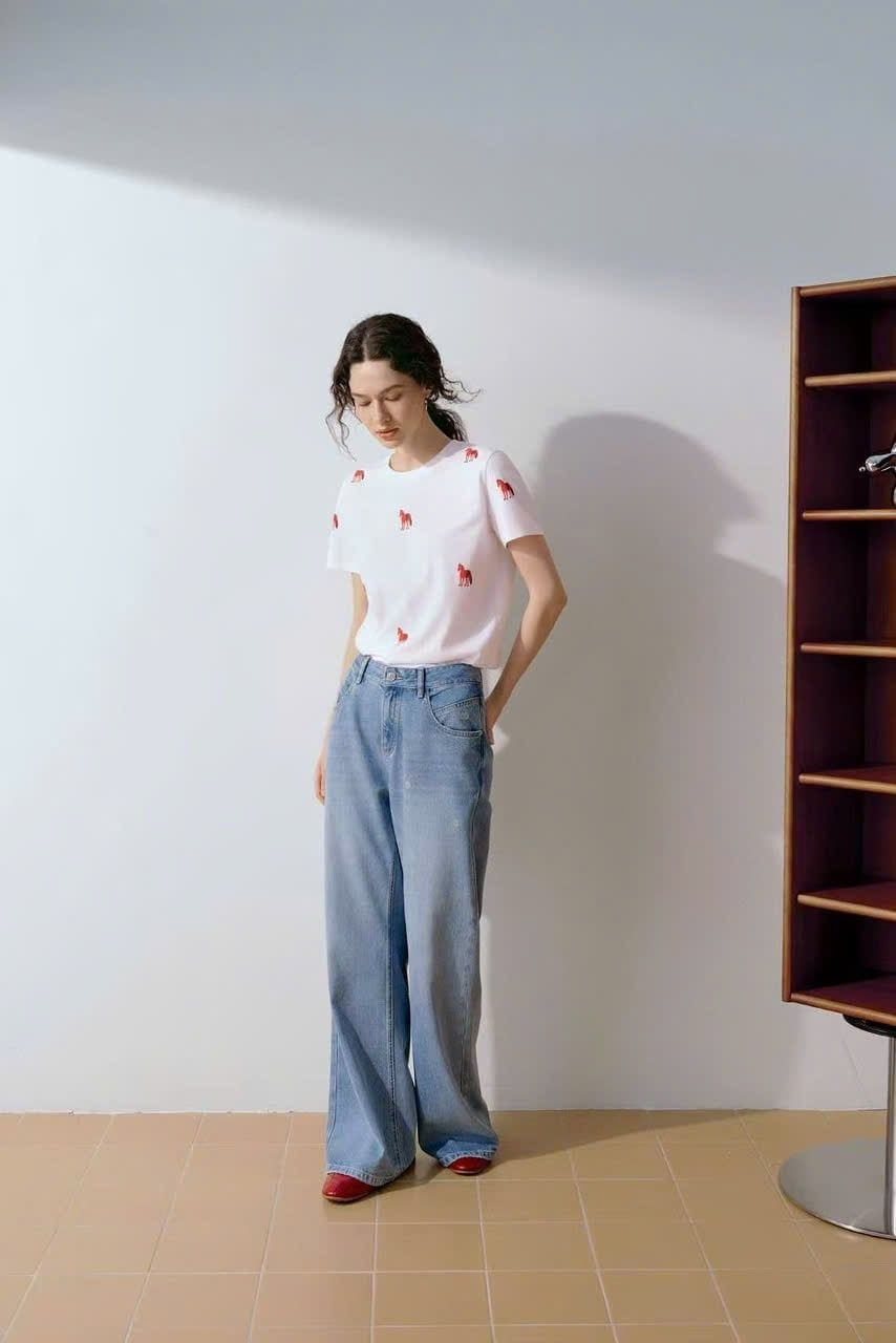  Jean xanh nhạt đính đá vẩy 