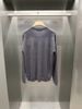  Áo Dài Tay Cashmere Xám Cổ Tròn Logo Da Ngực Trái 